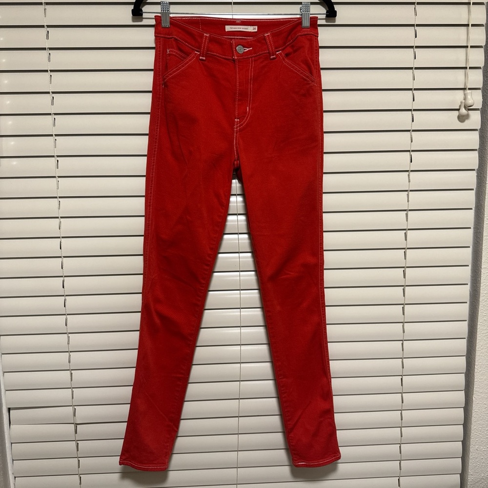 Vibrant Red Levi’s Skinny Jeans with Textured Appearance
